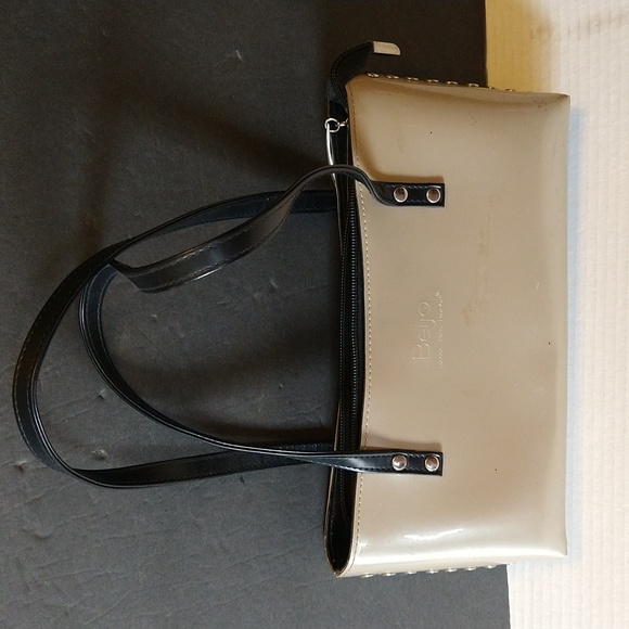 Beijo a pearlized gold color with black straps and trim. - Picture 1 of 14